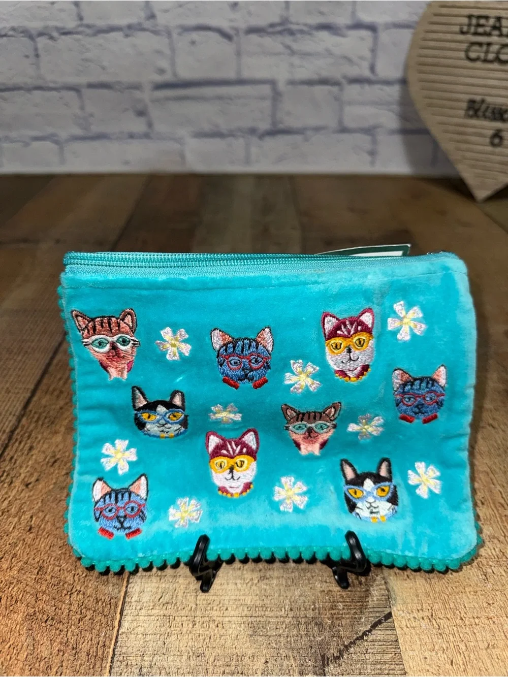 Karma living cat face Pom Pom pouch new with flaws